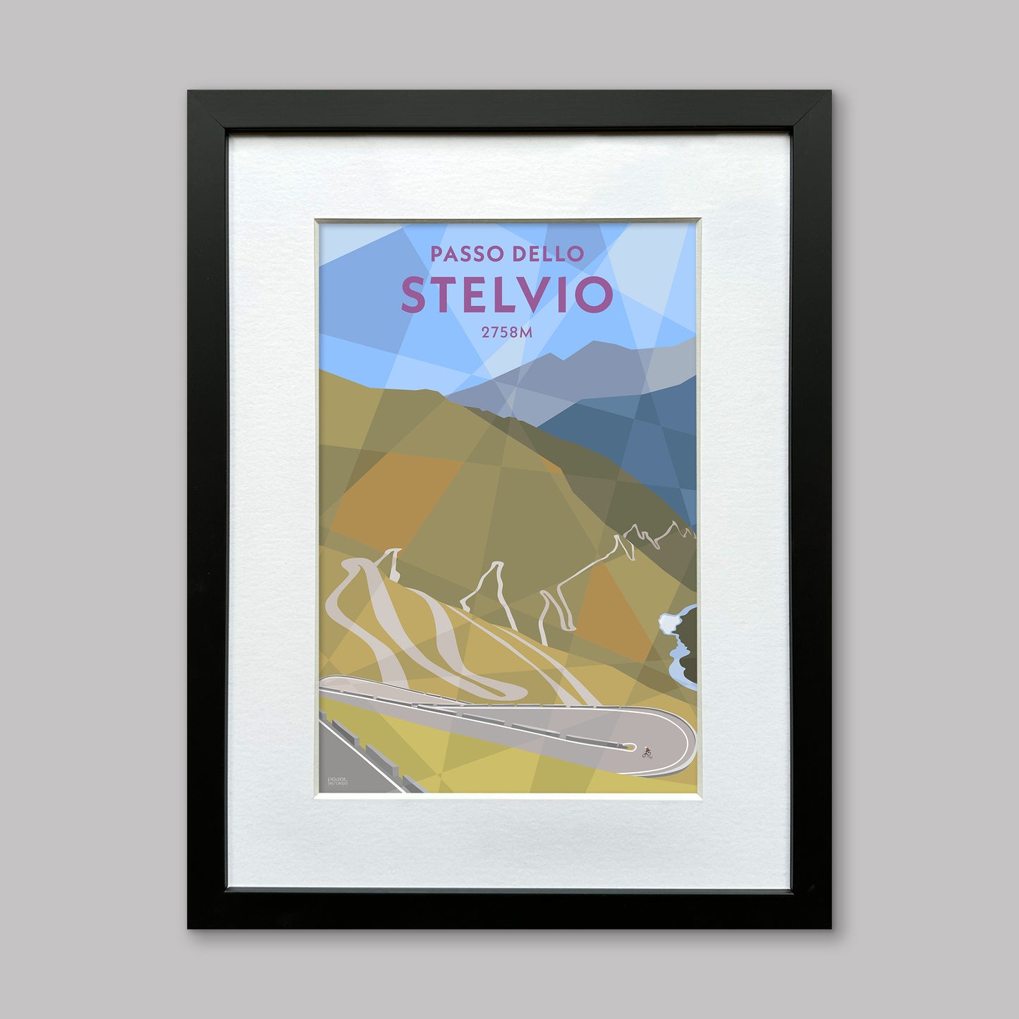 Print of a cyclist on the winding hairpins of the Stelvio climb in the Italian Alps. Presented in a black frame.